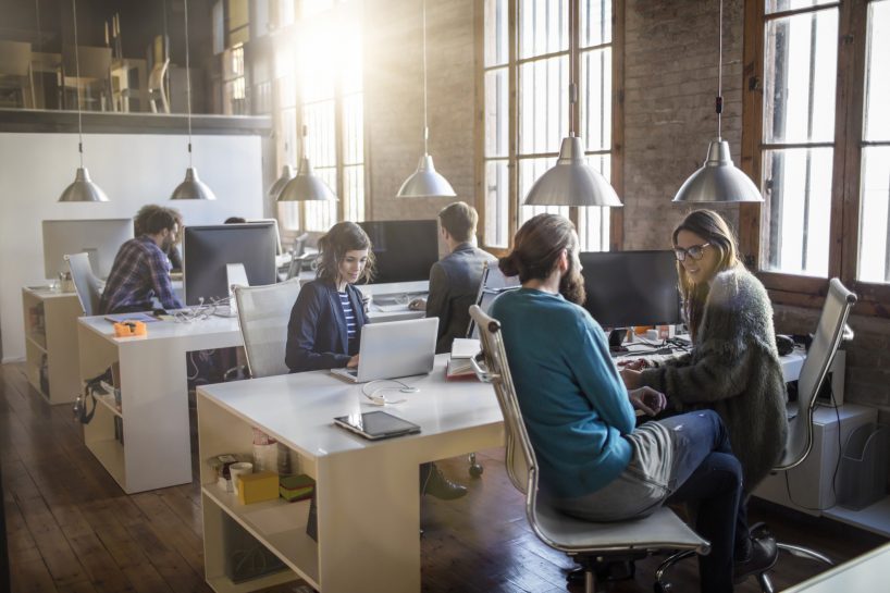 small office of people being served by a small internet connection