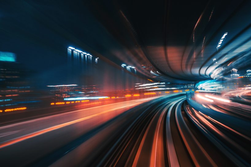 high speed highway with blurry lines depicting high speeds