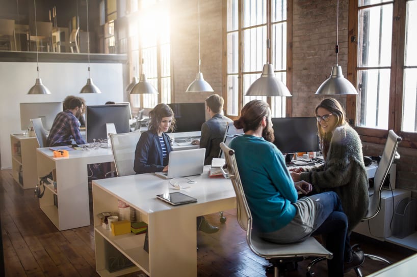 small office of people being served by a small internet connection