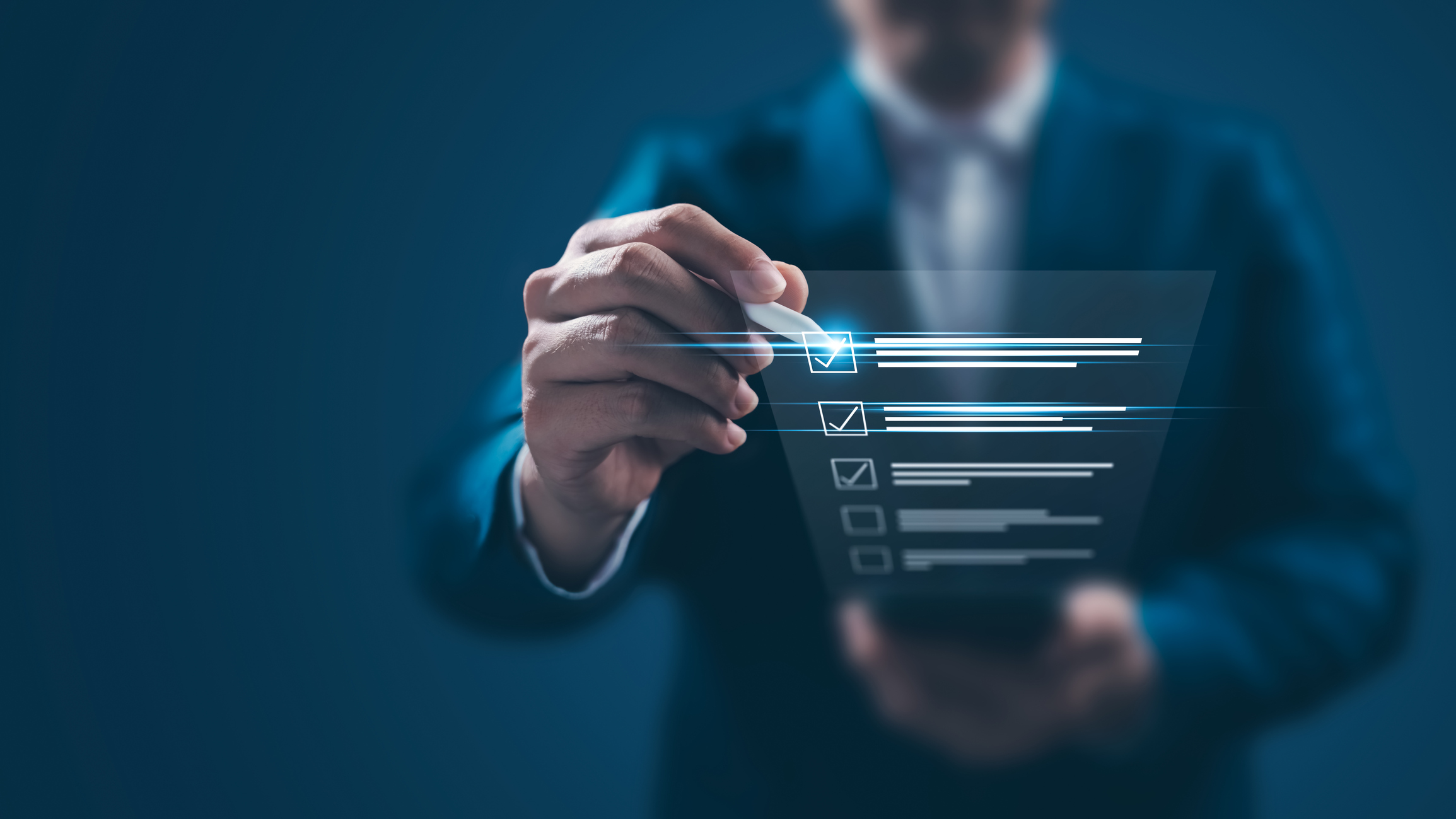 man using a check list to work through a list of tasks